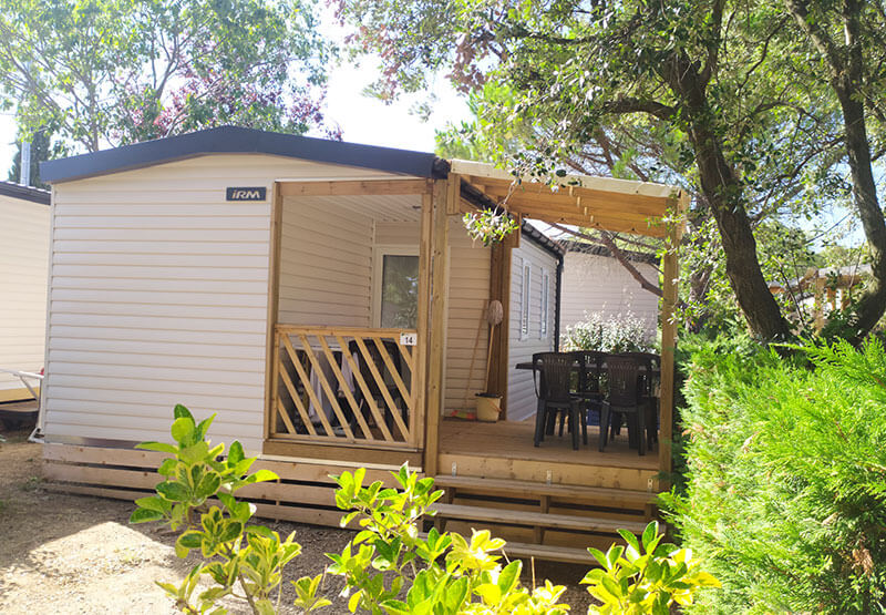 outside of Compact mobile home with view of terrace