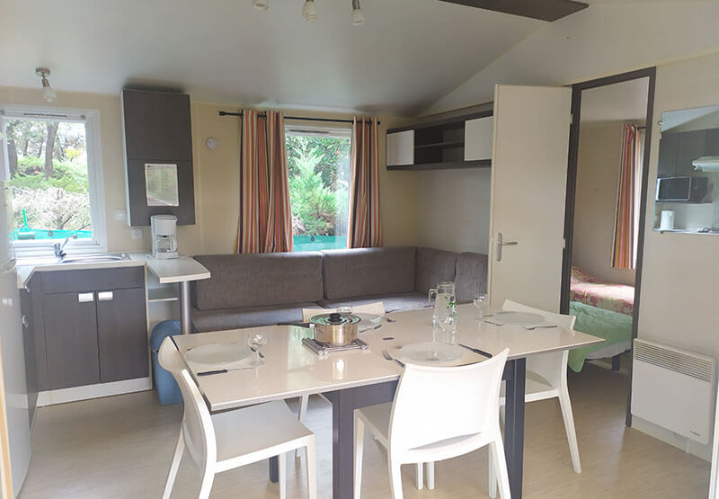 living-room with dining area, kitchen and bench seat