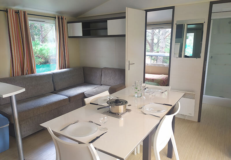 living-room with dining area, kitchen and bench seat