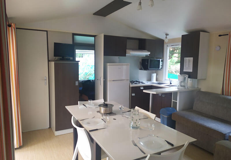 living-room with dining area, kitchen and bench seat